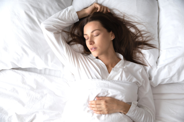 How to Get More Deep Sleep Naturally: 8 Tips and Hacks | Whether you suffer from chronic insomnia or occasionally sleeplessness, one thing is for certain: you want to know how to get more restorative sleep stat. While getting more sleep (at least 7-9 hours) is obviously the goal, more time in bed doesn't always mean you'll receive deep sleep. In this post, we share 10 warning signs you aren't getting enough slow-wave sleep, plus 8 natural sleep tips to help you wake up refreshed and energized!