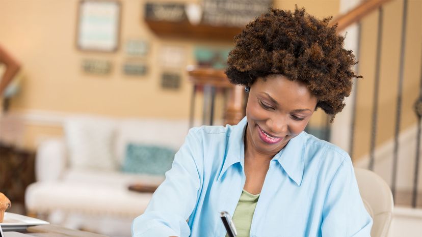 woman balancing checkbook