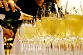 Serving champagne in fluted glasses concentrates the flavors and boosts the flow of bubbles. See more wine pictures.